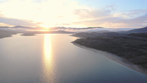 Aerial-drone-shot-of-sunset-on-the-big-lake