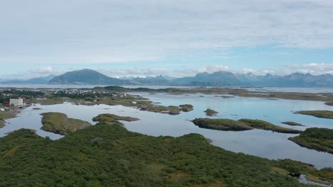 Aerial-View-Of-Sleneset-With-Lush-Green-Desolate-Islands-And-Settlement-In-Luroy,-Norway