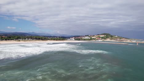 Aerial-drone-shot-of-Playa-Meron-Beach-in-San-Vicente-de-la-Barquera