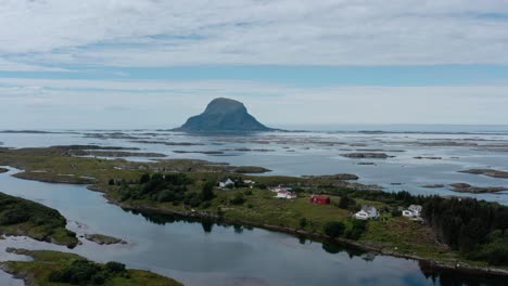 Aerial-View-Of-Lovund,-an-island-and-village-in-the-municipality-of-Lurøy-in-Nordland-county,-Norway---drone-shot