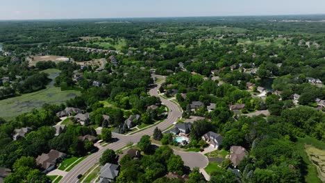 Suburban-living-area-with-a-winding-road-and-houses