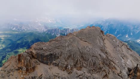 Aerial-view-on-rocky-mountaintop-of-Monte-Pelmo-in-Dolomites-during-cloudy-day