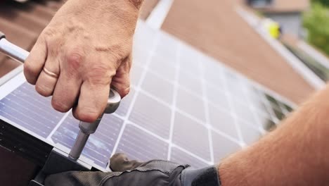 Securing-solar-panel-bolts-with-wrench-tool-installation
