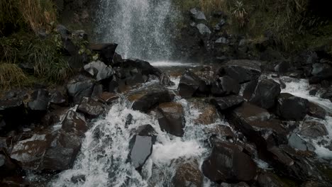 Waterfall-Cascading-Down-Rocks-At-Cayambe-Coca-National-Park-In-Papallacta,-Ecuador---slow-motion