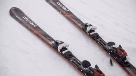 Slow-motion:-skis-are-launched-on-snowy-ground-in-the-Swiss-Alps