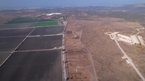 Aerial-push-in-of-large-compost-farm-land-landscapes-in-mexico