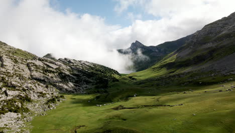 Valley-of-Schynige-Platte-on-a-sunny-day-with-some-clouds-covering-the-mountains-of-Switzerland