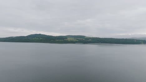 Aerial-Panning-Shot-Showing-Loch-Lomond-On-An-Overcast-Day
