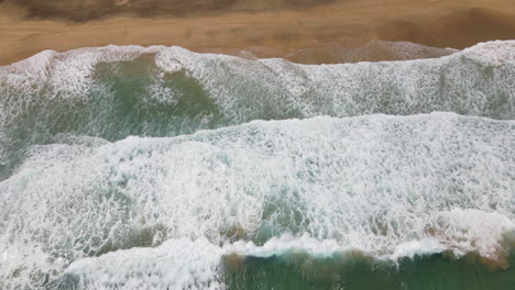 Fantastic-aerial-shot-revealing-the-cofete-beach-and-the-waves-breaking-on-the-shore