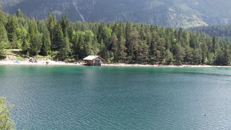 People-Swim-in-Lake-Blindsee,-Beautiful-Lake-in-the-Mountains-in-Tyrol-Austria