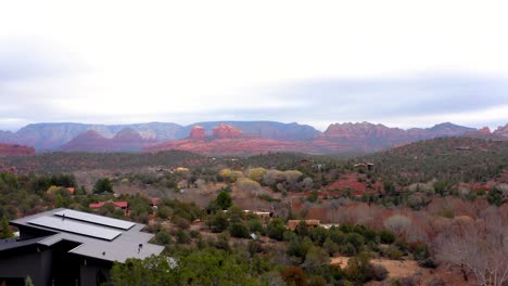 Drone-flight-reveals-stunning-desert-landscape-with-Cathedral-Rock,-Sedona