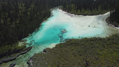 Aerial-orbiting-view-of-the-Natural-Pool-at-Oro-Bay-in-the-Isle-of-Pines,-New-Caledonia