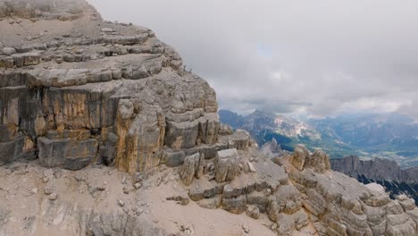 Forward-aerial-view-of-magnificent-dolomite-valley-through-a-close-up-of-mount-Pelmo