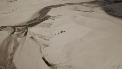 Aerial-shot-over-the-drying-river-due-to-the-drought-caused-by-global-warming-and-water-shortage-in-Europe