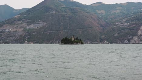 Loreto-Island-on-Lake-Iseo,-Italy-during-overcast-rainy-day