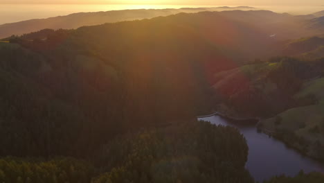 Aerial-view-of-the-Mt-Tamalpais-lagoon-and-wildlife-preserve-at-sunset---cinematic-lens-flare
