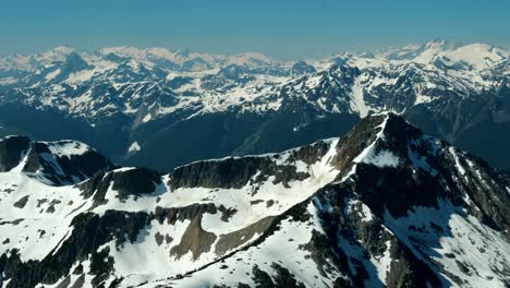 Panoramic-View-Of-Tszil-Mountain-Covered-With-Snow-At-Daytime-In-British-Columbia,-Canada