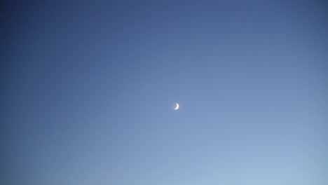 Timelapse-of-shining-moon-moving-on-blue-sky-shot