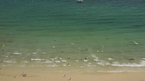 Several-Vacationists-In-The-Famous-St-Ives-Beach-In-Cornwall,-England
