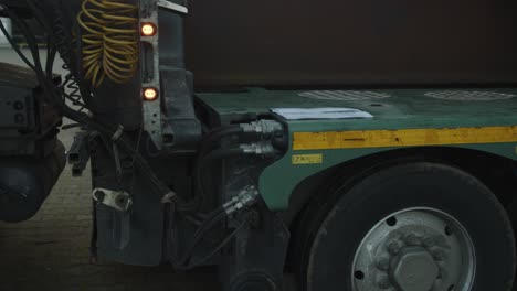 Close-up-of-a-truck-slowly-driving-by