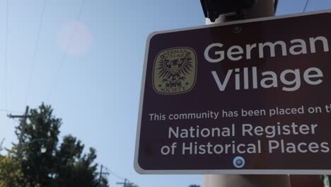 Historic-German-Village-sign-in-Columbus,-Ohio-with-video-panning-left-to-right-in-slow-motion