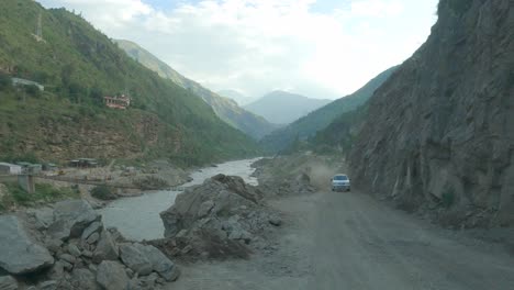 A-point-of-view-shot-of-a-driver-riding-through-dusty-and-damaged-road-after-the-landslide-in-Shimla-Kinnaur-road