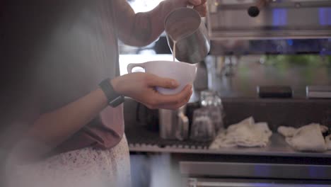 Woman-making-cup-of-hot-coffee