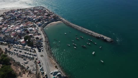 Drone-flying-around-Cova-do-Vapor-village-and-harbour