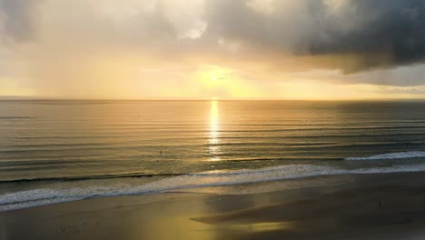 Sun-rising-at-beach-in-a-calm-morning