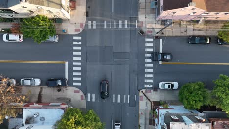 Top-down-aerial-of-traffic-and-cars-at-intersection