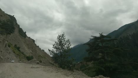 A-timelapse-of-a-vehicle-passing-through-the-most-dangerous-and-narrow-cliff-carved-roads-through-Indian-Himalayas-in-Kinnaur-District-on-way-to-Sangla-and-Chitkul-valley-2