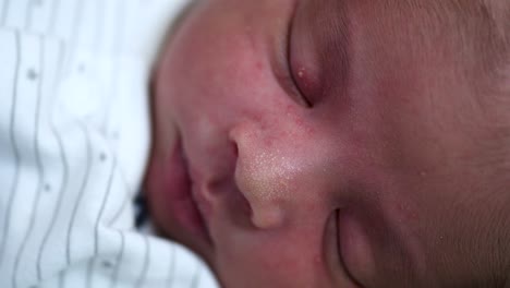 Close-Up-Portrait-Of-Sleeping-New-Born-Indian-Baby-Boy