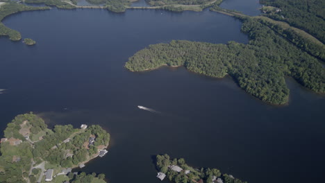 Aerial-hyperlapse-timelapse-of-Hyco-Lake-in-North-Carolina-showing-boats-wiggling-back-and-forth-on-the-water