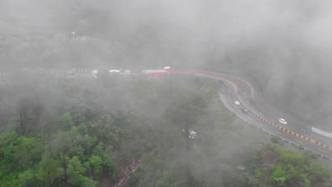 Aerial-Birds-Of-Muree-Expressway-Through-Misty-Foggy-Trees-In-Punjab