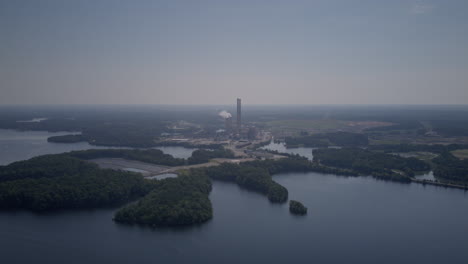 Fast-aerial-timelapse-hyperlapse-of-a-power-plant-in-the-hazy-clouds-off-of-Hyco-Lake-in-North-Carolina
