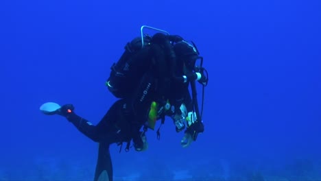 Technical-diver-diving-on-rebreather-in-the-deep-blue-water-in-the-Red-Sea