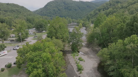Aerial-footage-over-trees-revealing-a-creekbed-in-western-North-Carolina