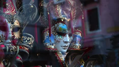 Beautiful-decorated-Venetian-Carnival-Masks-seen-in-one-of-the-shops-in-Venice