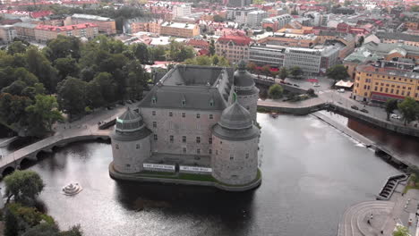 Wide-angle-aeriel-shot-of-Örebro-castle-in-Sweden