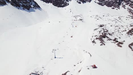 Flying-Over-Ski-Resort-Portillo-In-The-Andes-Mountains-Of-Chile---drone-shot