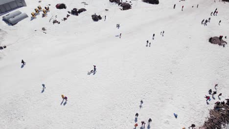 Aerial-View-Of-People-At-Ski-Resort-Portillo-In-Chile---drone-shot