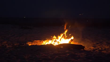 Blazing-Campfire-On-Beach,-Summer-Evening