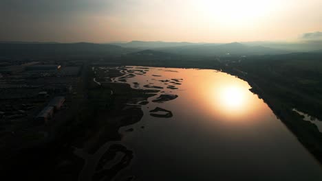Sensational-aerial-drone-view-of-Koper-Capo-d'istria-wetland-river,-sunset,-dolly-in