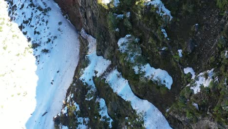 Aerial-shot-of-the-snow-on-top-of-Pico-Ruivo-in-Madeira