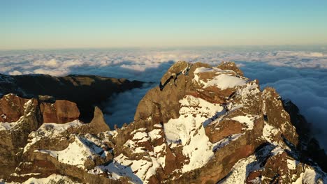 Aerial-shot-of-the-snowy-peak-of-the-mountain-Pico-Ruivo-in-Madeira