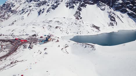 View-of-the-Laguna-del-Inca-during-Winter-in-Portillo,-Chile---drone-shot