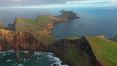 Drone-shot-over-Sao-Lourenco-peninsula-and-islands-in-Madeira-during-sunset