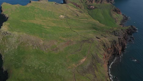 Drone-shot-over-the-grass-fields-on-the-peninsula-in-Madeira