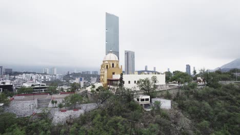 Drone-shoot-at-morning-cloudy-day-at-hasta-bandera-over-obispado-hill-at-Monterrey-City,-Mexico-7