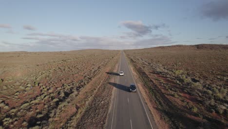 Vechile-travelling-along-scenic-wide-open-road,-outback-Australia